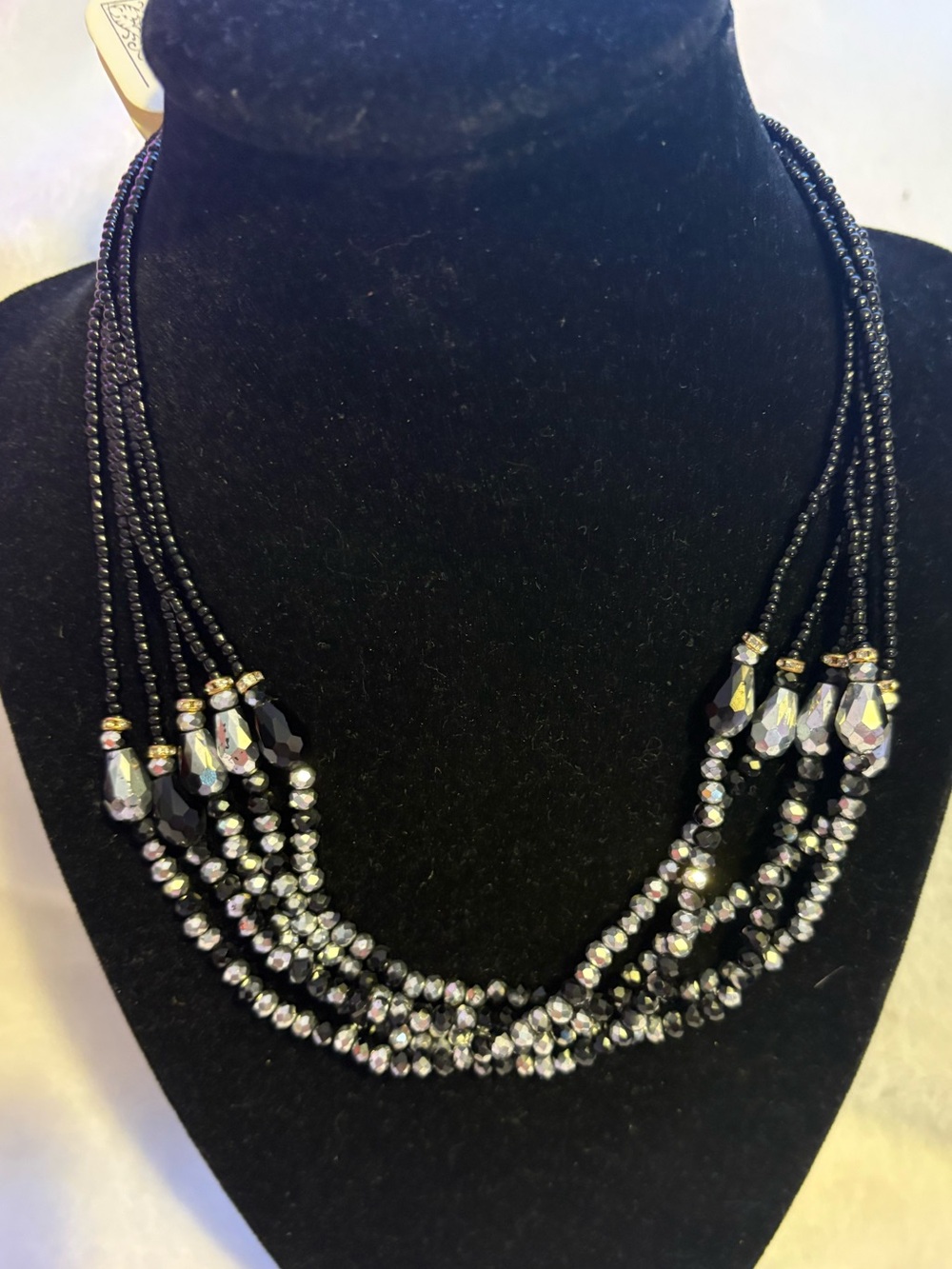 Multi-Strand Black Beaded Necklace with Faceted Accents
